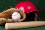 Helmet, glove, ball, and bat.